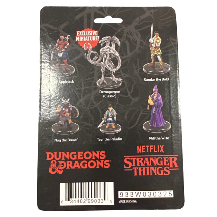 Dungeons & Dragons Co. Netflix Stranger Things exclusive miniature card featuring six character miniatures: Applejack, Demogorgon (Classic), Sundar the Bold, Nog the Dwarf, Tayr the Paladin, and Will the Wise, on a black backing card.