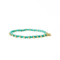 Kami Crystal + Brass Charm Stretch Bracelet in Teal + Gold by Ink & Alloy